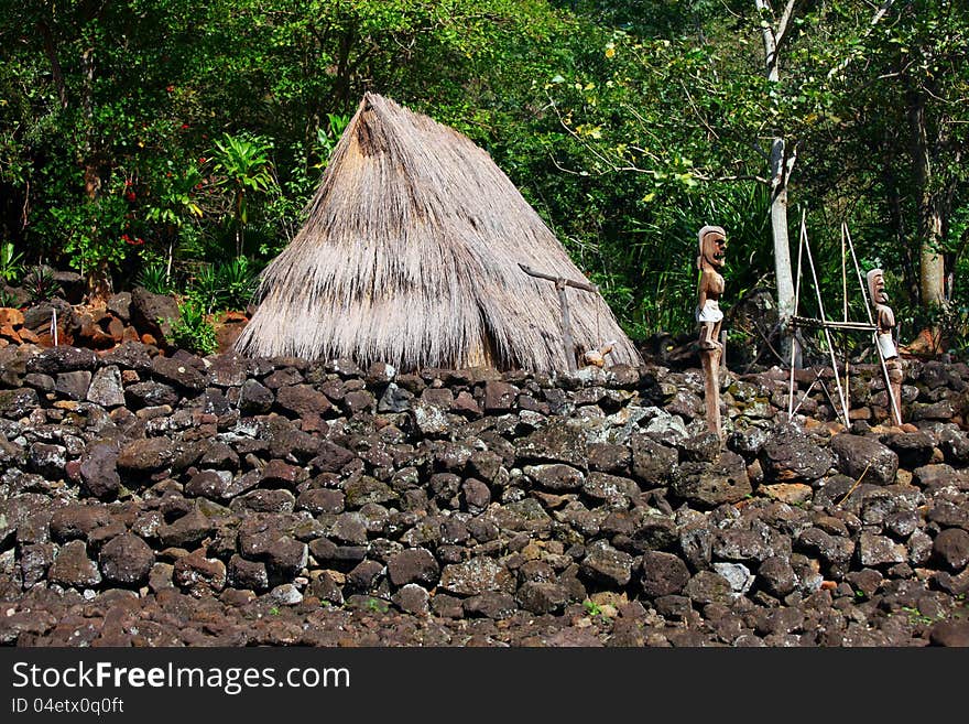 Hut and sacrificial figures, waimea valley, oahu, hawaii. Hut and sacrificial figures, waimea valley, oahu, hawaii