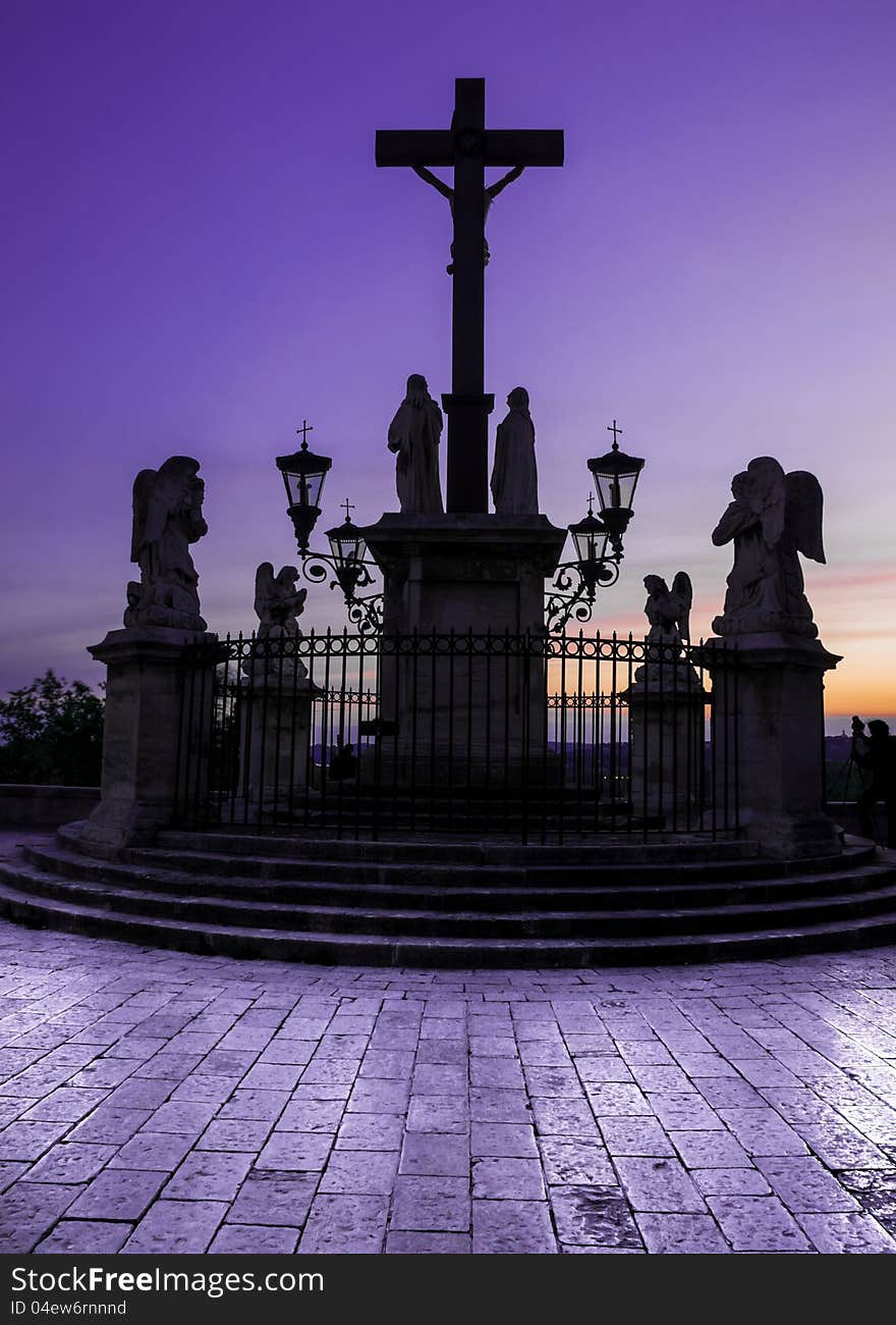 Avignon cathedral cross at colorful sunset. Avignon cathedral cross at colorful sunset