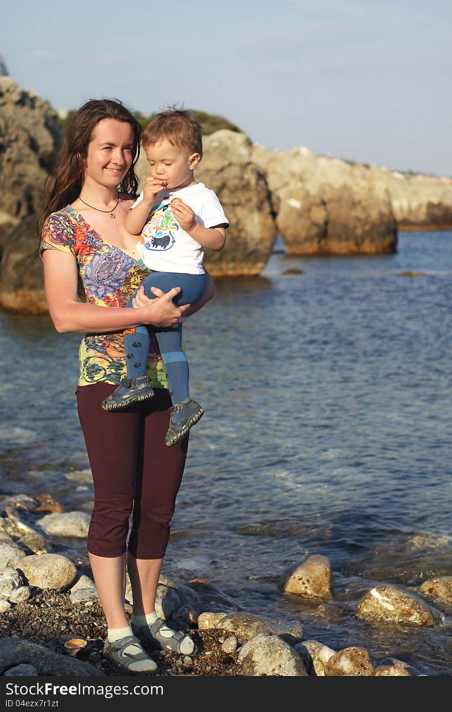 Mother With Child At Seaside