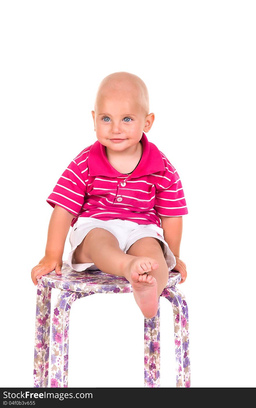 Boy Sitting On A Vintage Chair, Laughing