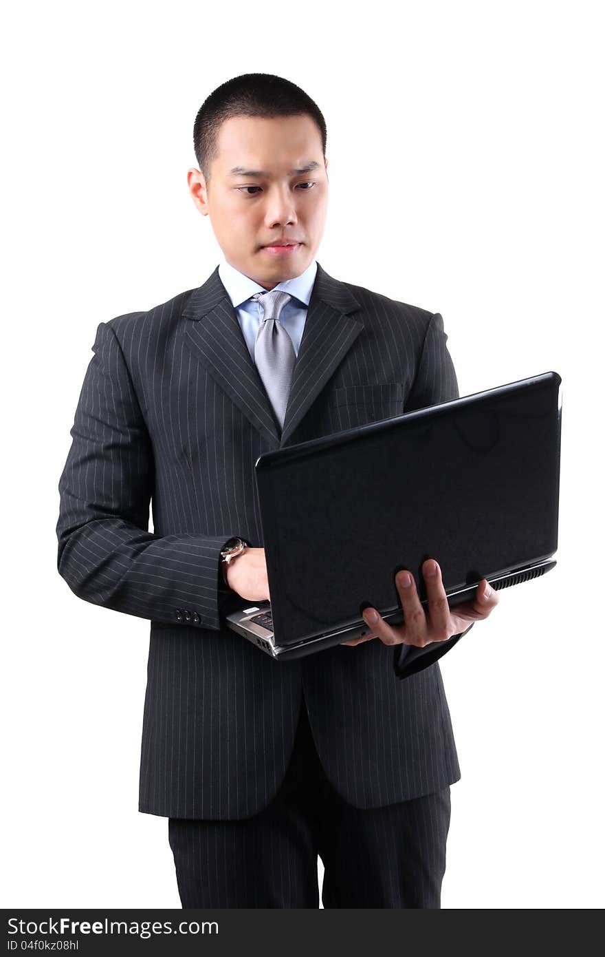 Businessman holding laptop isolated on white background. Businessman holding laptop isolated on white background