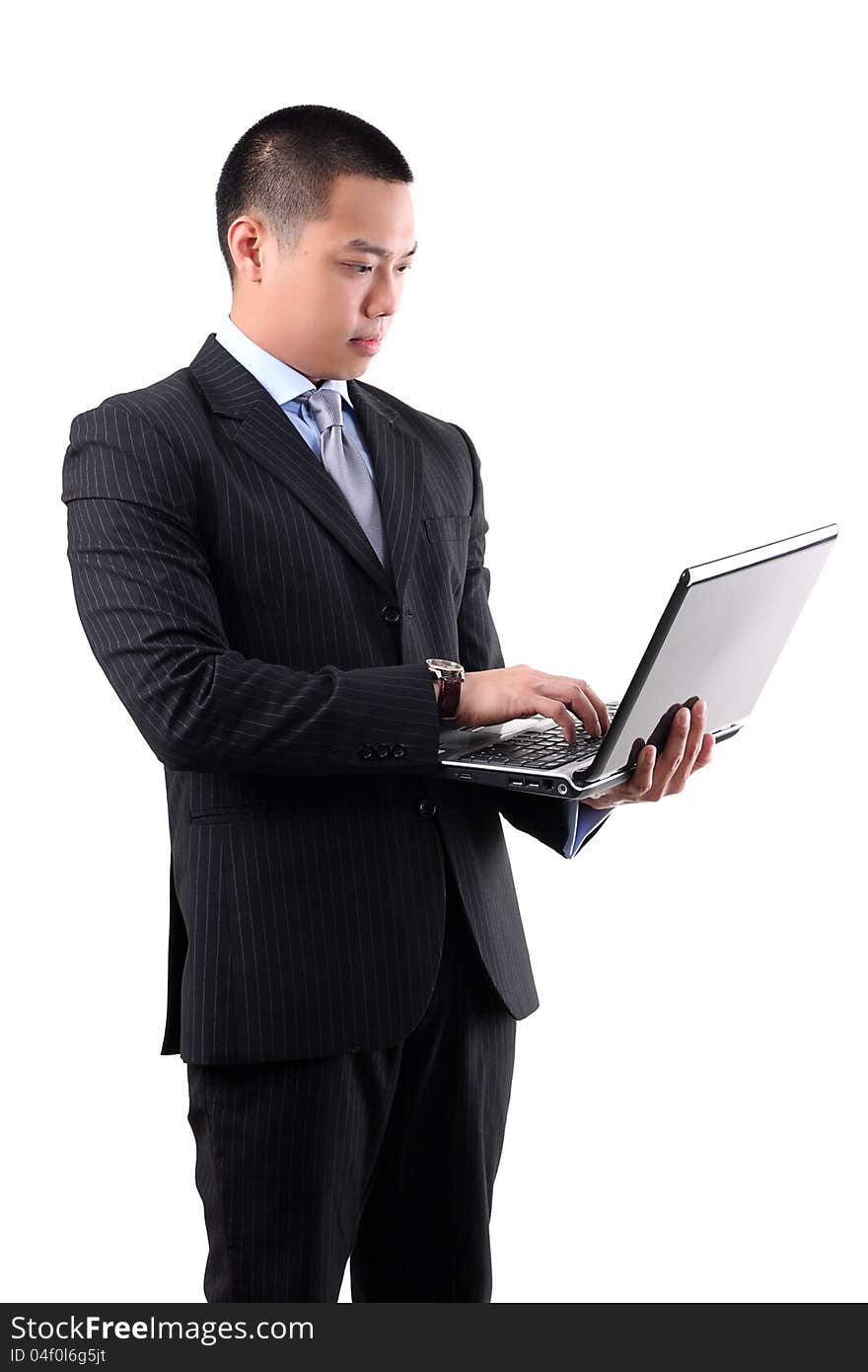 Businessman holding laptop isolated on white background. Businessman holding laptop isolated on white background