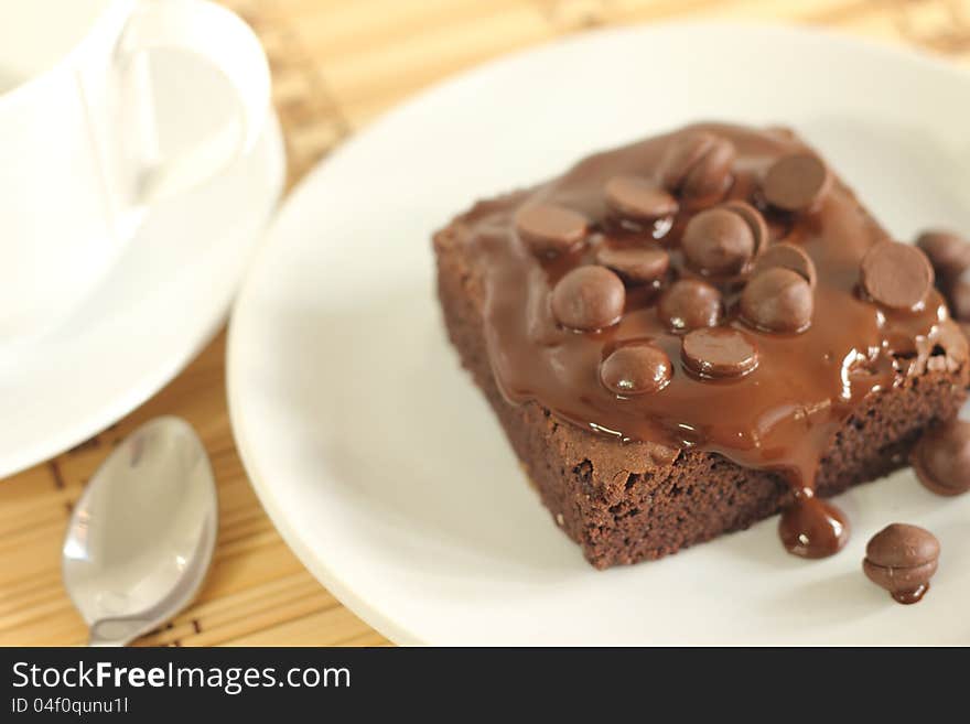 Chocolate cake and  spoon