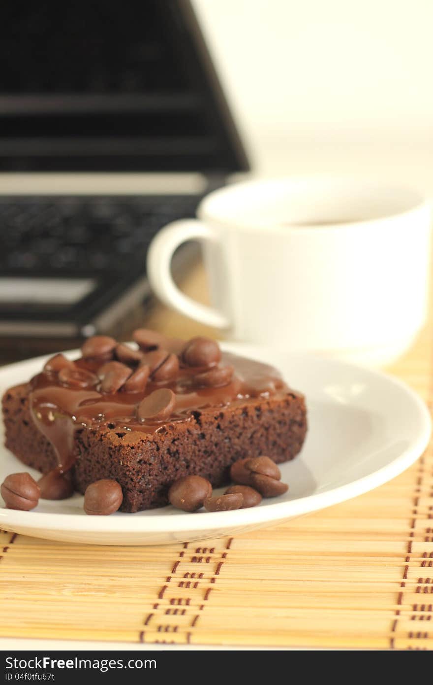 Chocolate cake a cup of coffee