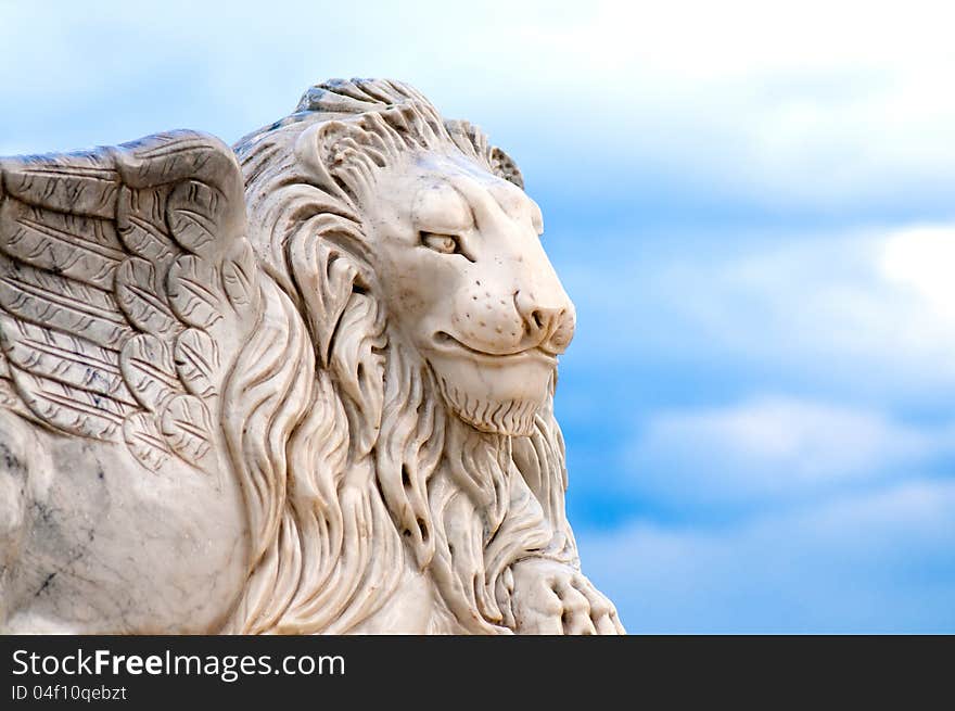 Winged lion head, detail of antique statue