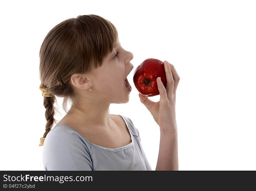 Image of the girl eating an apple. Image of the girl eating an apple