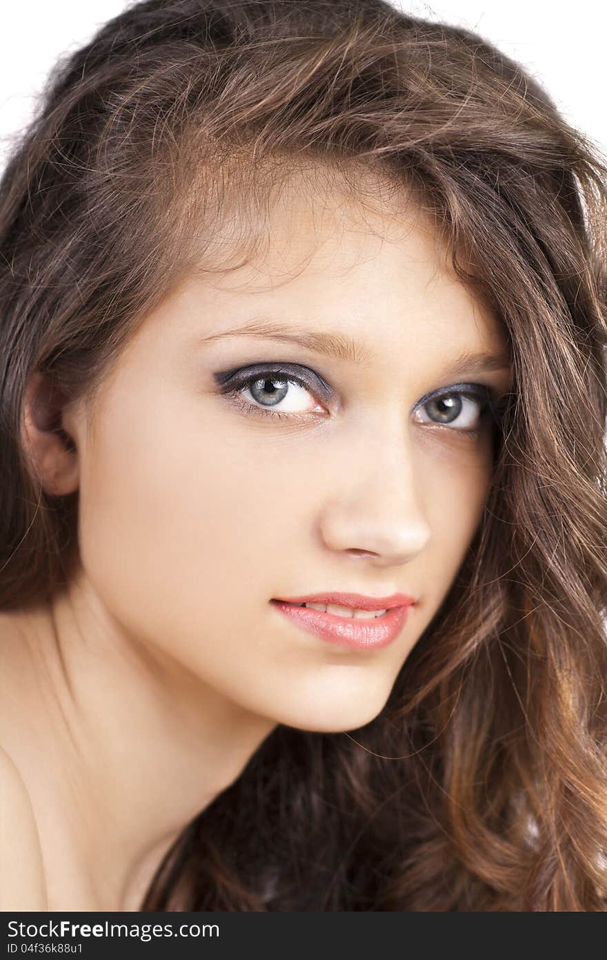 Portrait of beautiful young woman with brown hair isolated on white background, close up. Portrait of beautiful young woman with brown hair isolated on white background, close up