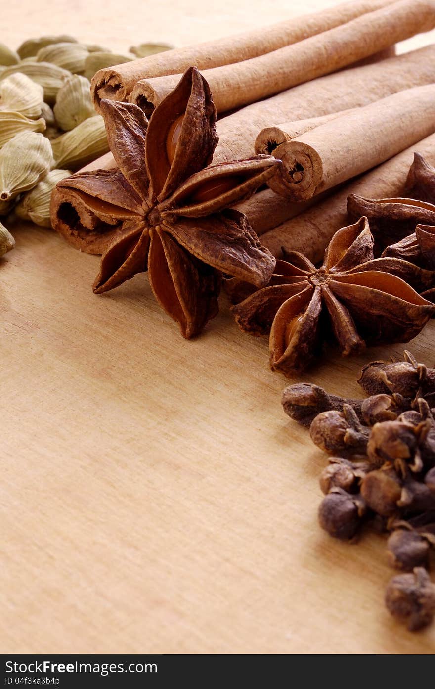 Various Spices On The Wooden Board