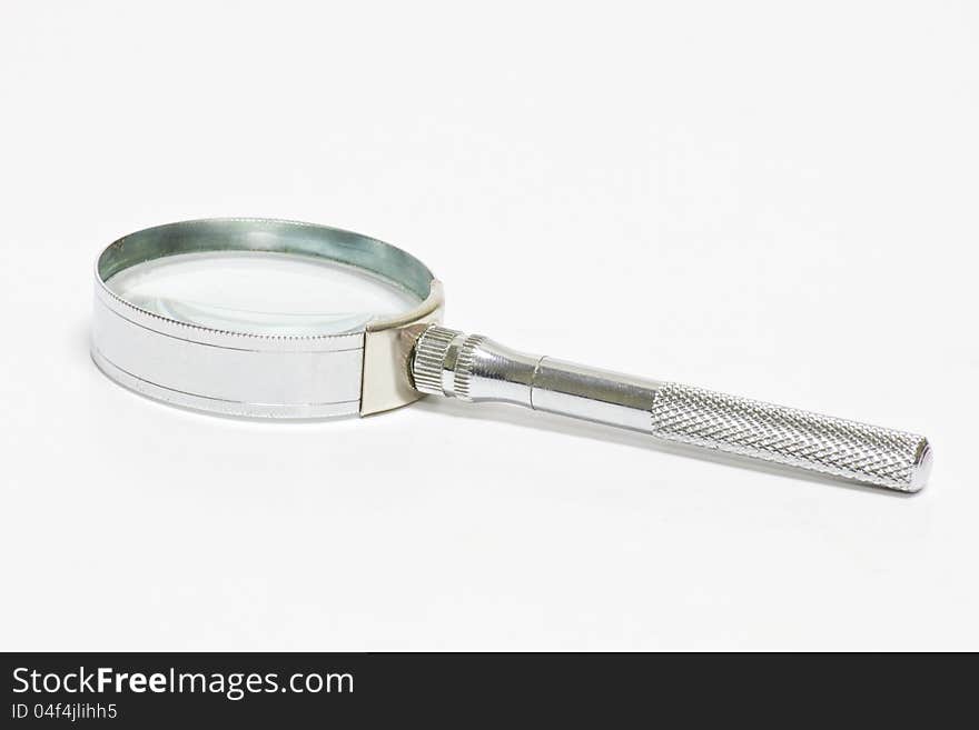 Magnifying glass on white background