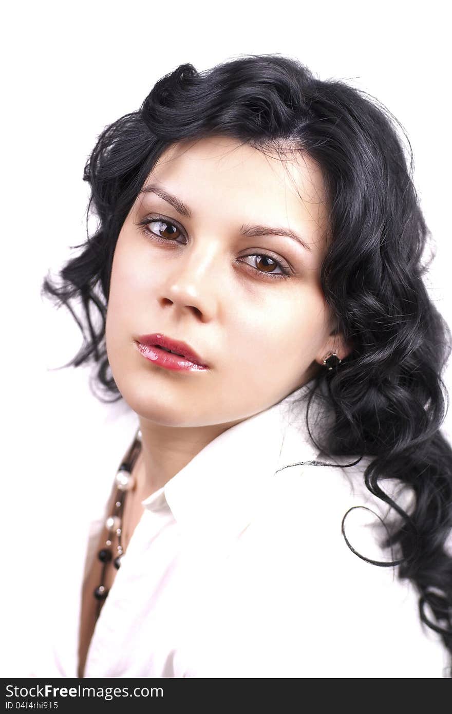 Portrait of sexual woman with long curly hair isolated on white background