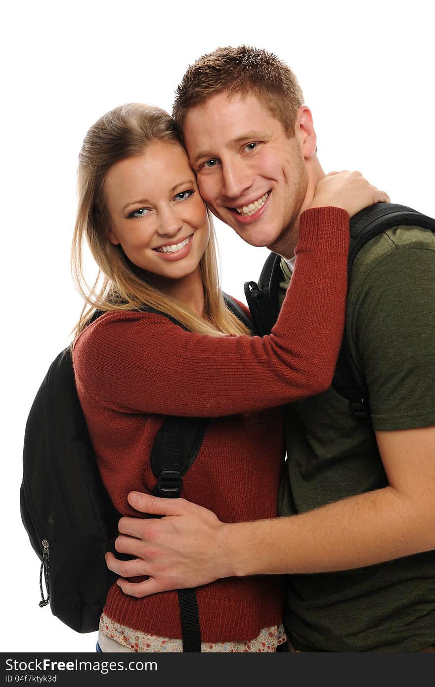 Young students couple smiling isolated on a white background