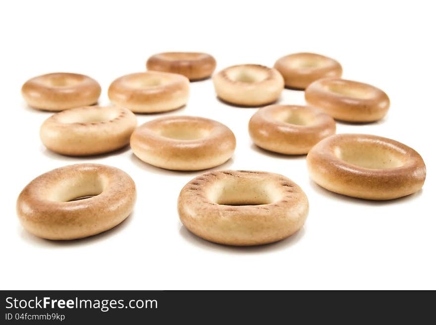 Delicious bagels on white background