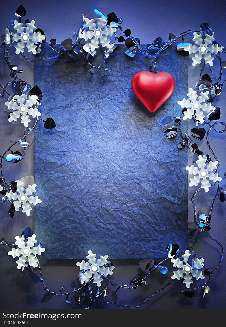 Blue paper bordering with christmas decoration. Blue paper bordering with christmas decoration