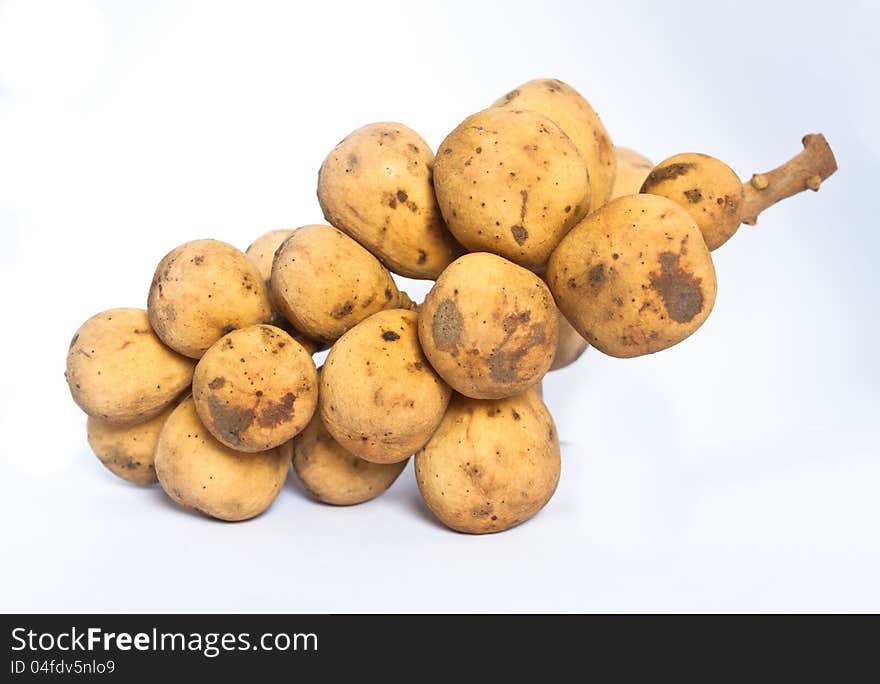 Isolated macro image of the tropical Langsat fruit (Lansium domesticum).