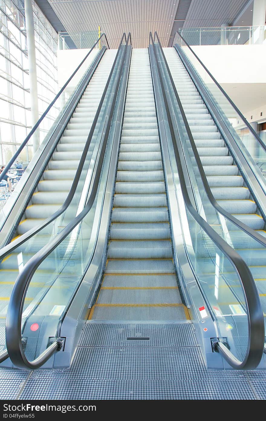 The close-up of escalator with three channels. The close-up of escalator with three channels