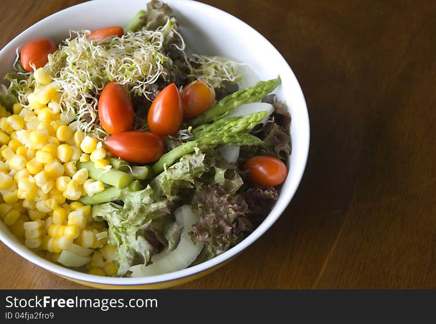 Mixed Salad On Wood Background