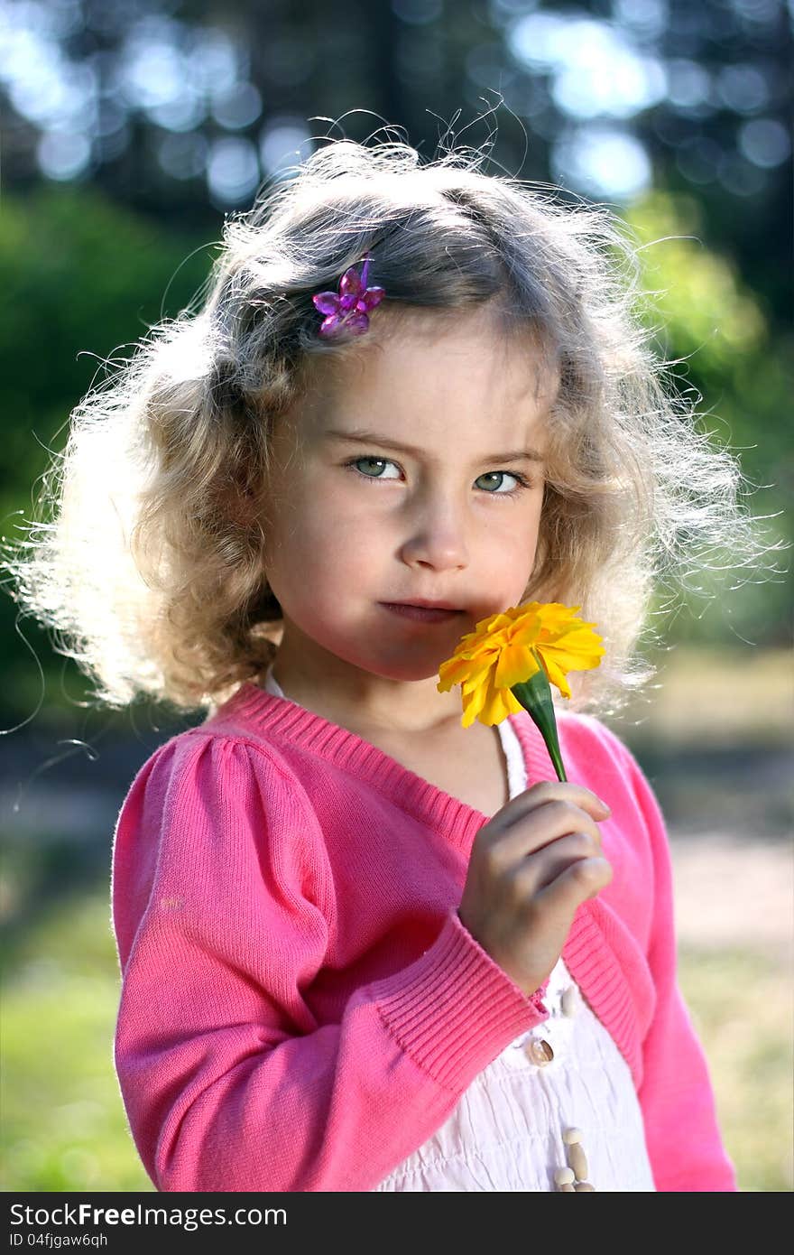 Lovely Girl With A Flower