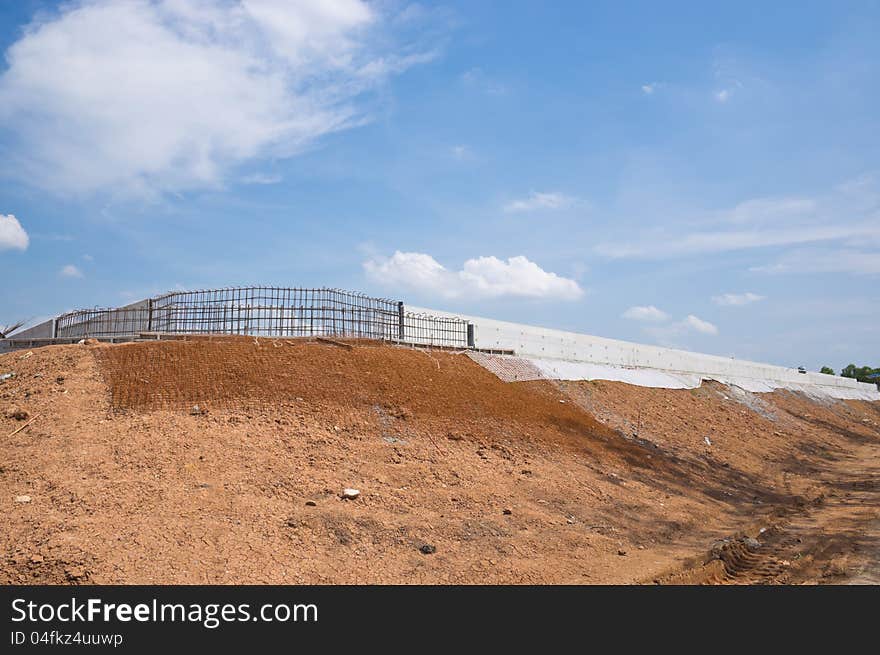 Concrete dam with blue sky