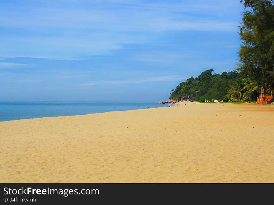 Long sandy beach at Teluk Cempedak near Kuantan, Malaysia.