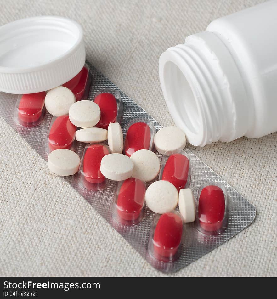 Collection of medicine pills on table