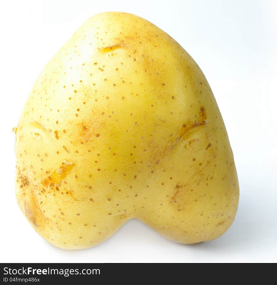 Potato isolated upside down heart-shaped with a white background