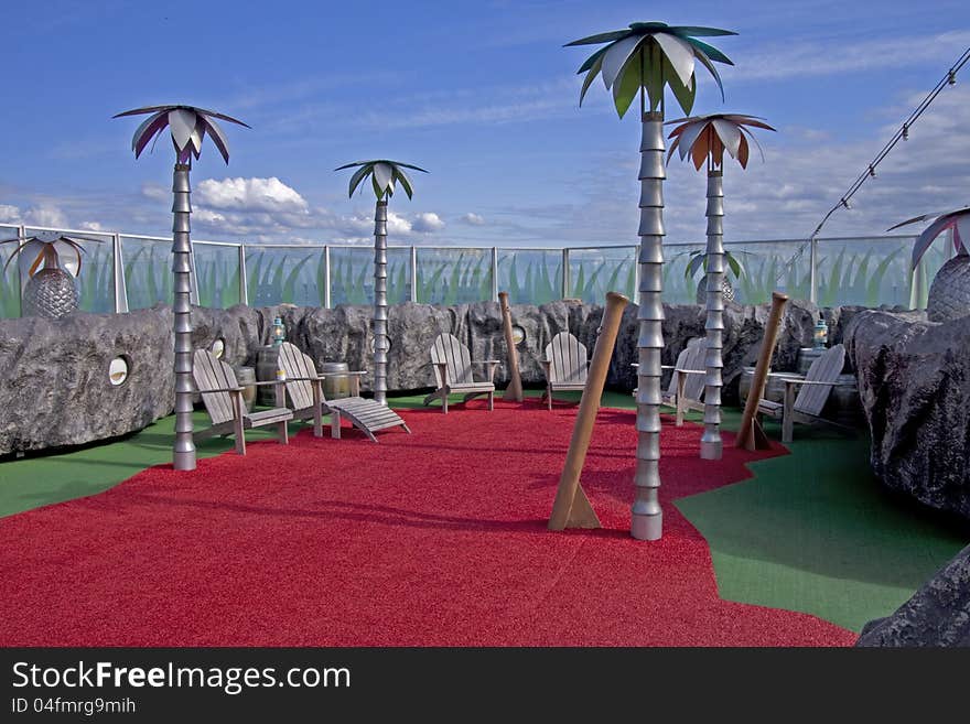 Children's play area with palm tree lights and small chairs to have fun in. Children's play area with palm tree lights and small chairs to have fun in.