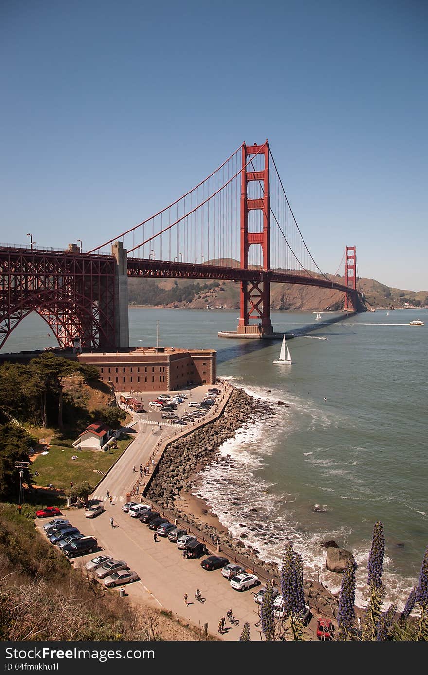 Scenic view of Golden Gate Bridge and historic Fort Point on a sunny day seen from San Francisco.