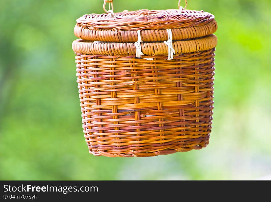 It is a basket ,and is weaved with wild rattan by hand by zhuang people in guangxi province ,china. It is a basket ,and is weaved with wild rattan by hand by zhuang people in guangxi province ,china