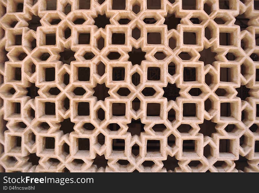 Beautiful lattice work on the walls of the Tajmahal. Beautiful lattice work on the walls of the Tajmahal