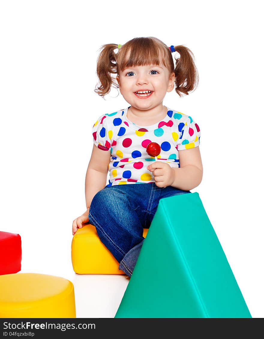 Little girl holding candy