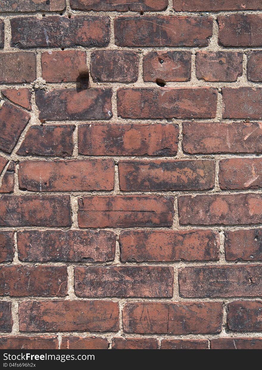 Worn Red Brick Wall