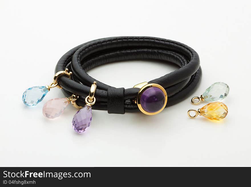 Leather bracelet decorated by beautiful gemstones