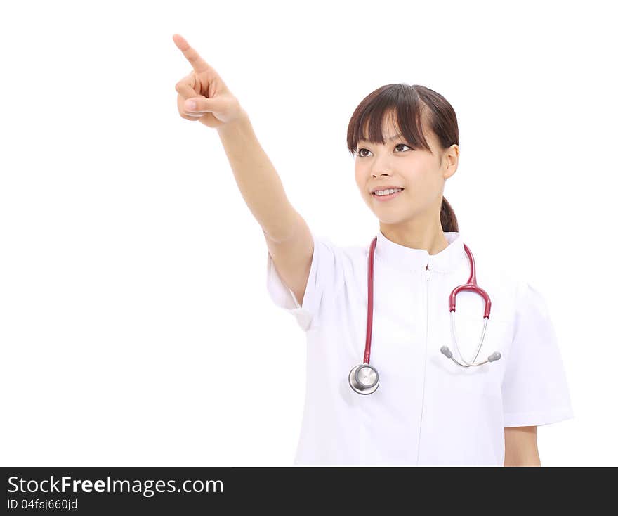 Portrait of happy young asian female nurse pointing