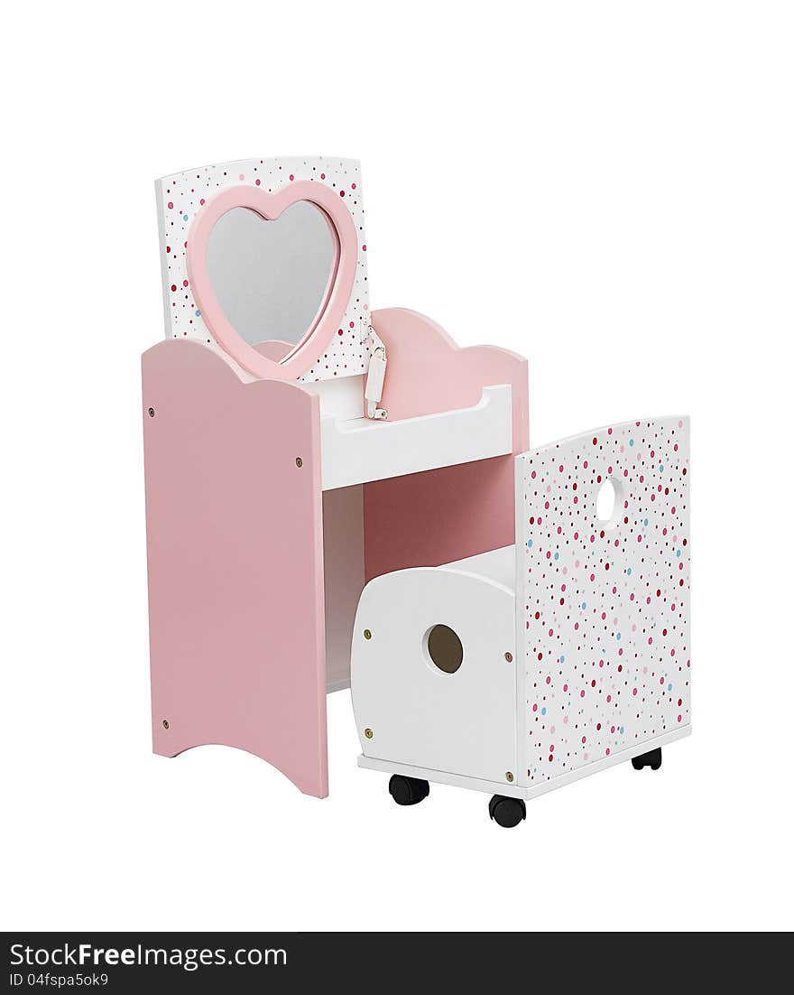 A small dressing table with chair for a girl