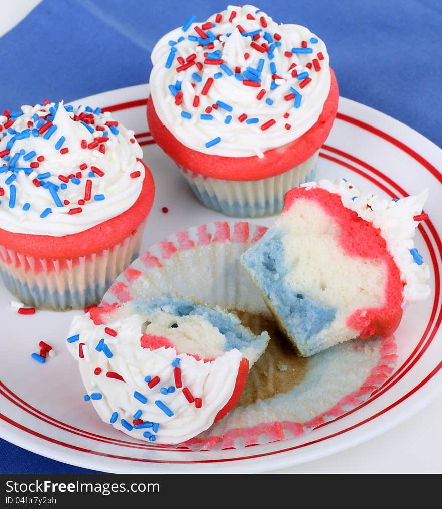 Red white and blue cupcakes on a plate