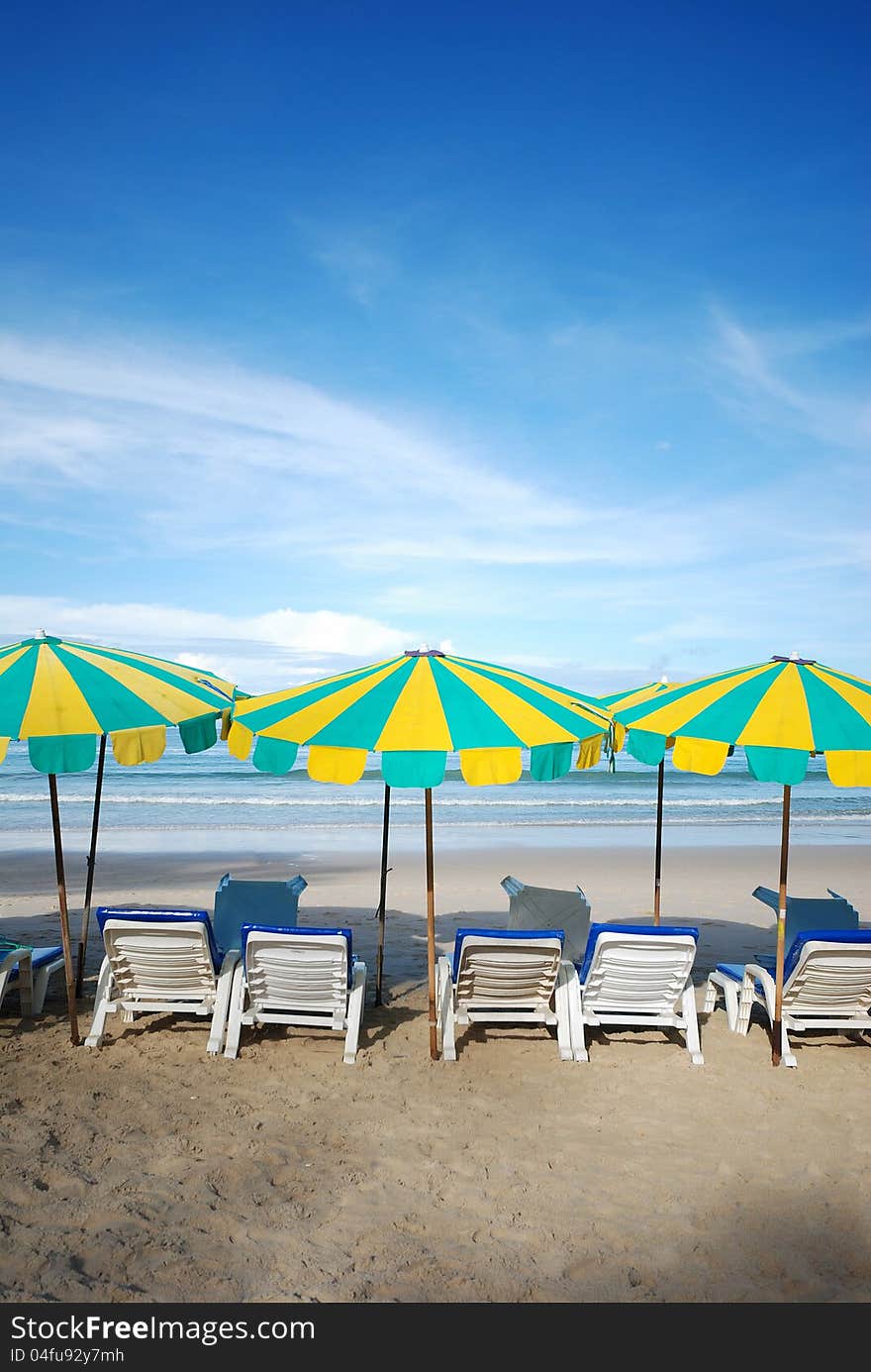 Beach chair. Sunbathing on the beach at the resort during the summer season looks