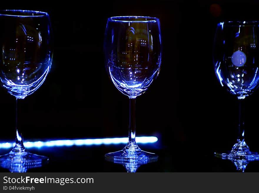 Empty sparkling glasses in bar