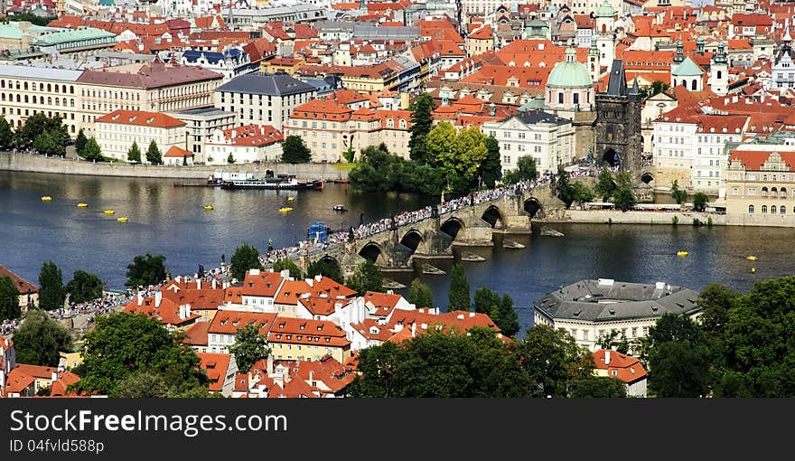 Bird watch view of a very crowded Charles bridge in Prague (Czech Republic)