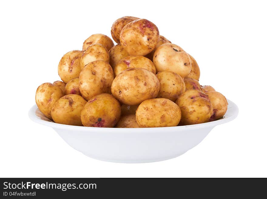 Potatoes in plate isolated on a white background