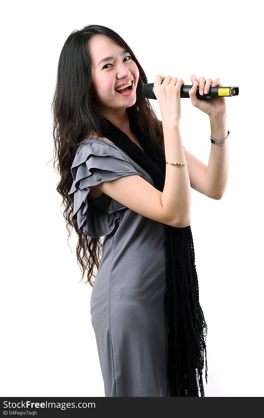 Asian karaoke singer isolated on a white background. Asian karaoke singer isolated on a white background.