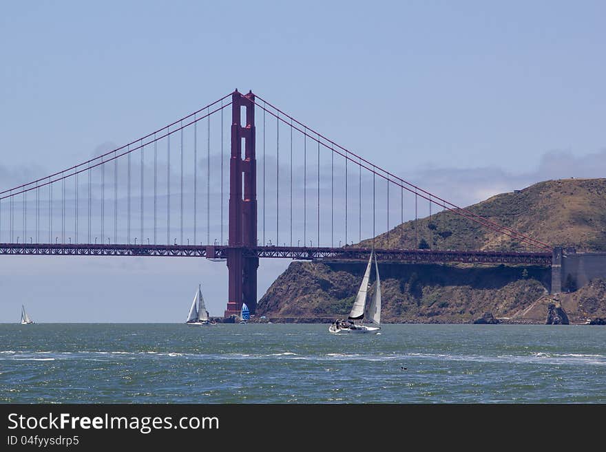 Sail boats taking advantage of a sunny day near the Golden Gate Bridge. Sail boats taking advantage of a sunny day near the Golden Gate Bridge.