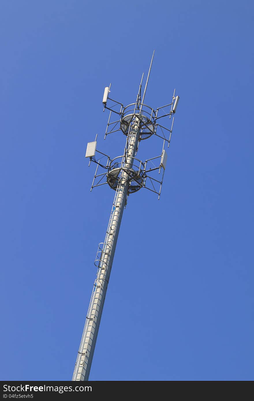 Telecommunications tower. Mobile phone base station in Blue Sky