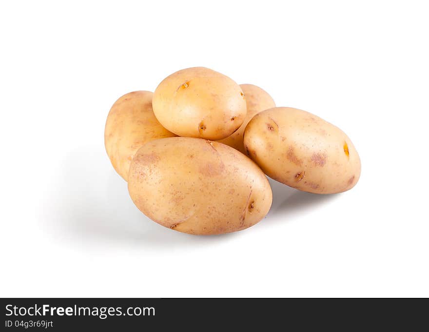 Raw potatos isolated on white