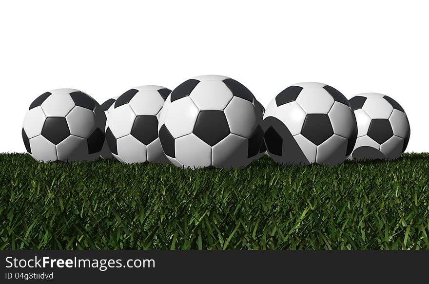 Soccer balls on a green grass - white background