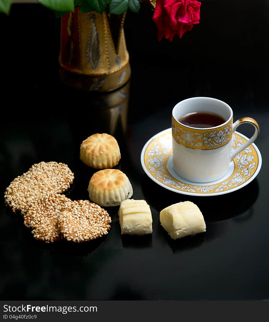 Oriental cookies and cup