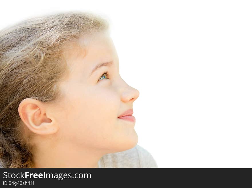 Smiling teen girl looking up at isolated on white background. Smiling teen girl looking up at isolated on white background