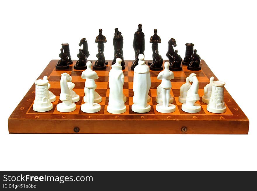 Vintage chessboard with black and white original figures, isolated on a white background. Vintage chessboard with black and white original figures, isolated on a white background.