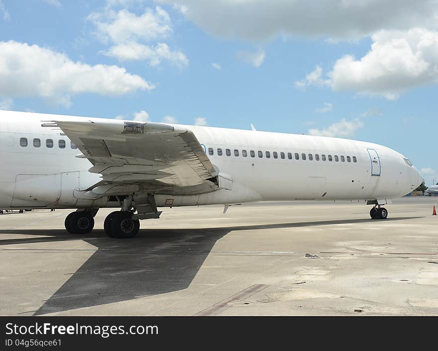 Jet airplane fuselage and nose view on the ground. Jet airplane fuselage and nose view on the ground