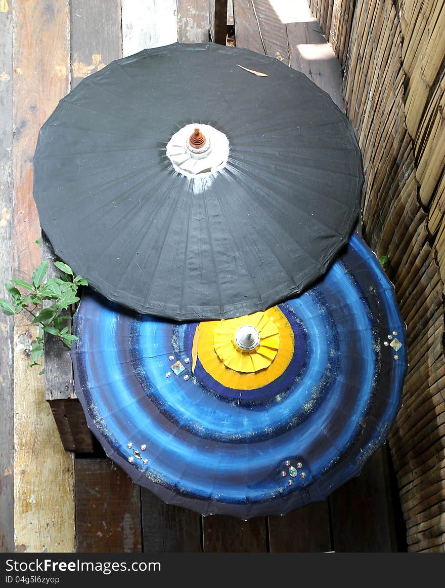 Image of top view Thai traditional umbrella is made of bamboo and paper in Thai house