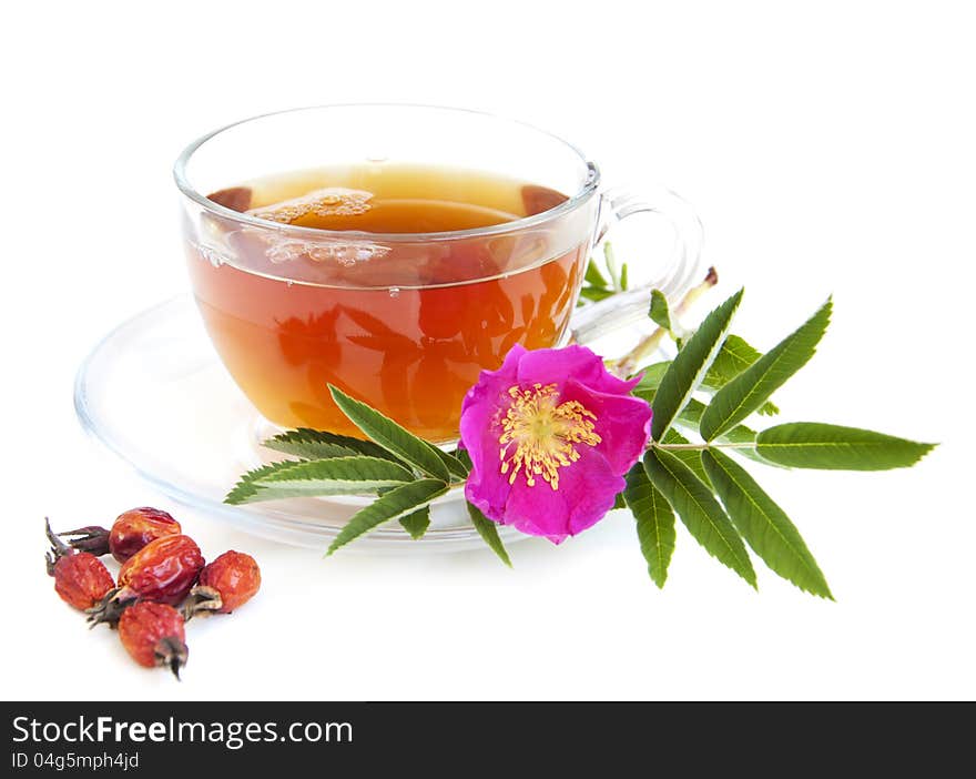 Cup of rose hip tea on a white background